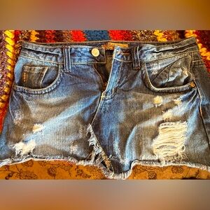 Distressed Denim mini skirt